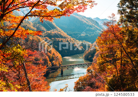 Fukushima, JAPAN - Nov 10, 2024: Tadami line railroad bridge across Tadami river in Fukushima Fukushima, JAPAN - Nov 10, 2024: Tadami line railroad bridge across Tadami river in Fukushima 124580533