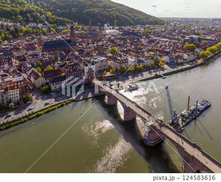 Aerial view of Heidelberg city, Germany. Heidelberg town with the famous Karl Theodor old bridge and Heidelberg castle. Aerial view of Heidelberg city, Germany. Heidelberg town with the famous Karl Theodor old bridge and Heidelberg castle. 124583616