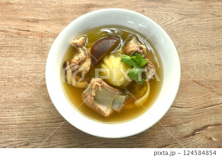boiled pickled cabbage with pork bone and black mushroom in clear soup on bowl  124584854