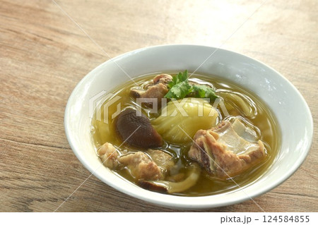 boiled pickled cabbage with pork bone and black mushroom in clear soup on bowl boiled pickled cabbage with pork bone and black mushroom in clear soup on bowl 124584855