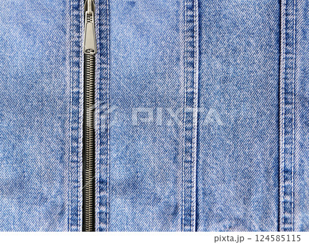 Dark blue denim background with zipper. Blue color denim jeans fabric texture and close zip. Decorative backdrop with zipper or fastener and jeans fabric material. Copy space for text Dark blue denim background with zipper. Blue color denim jeans fabric texture and close zip. Decorative backdrop with zipper or fastener and jeans fabric material. Copy space for text 124585115