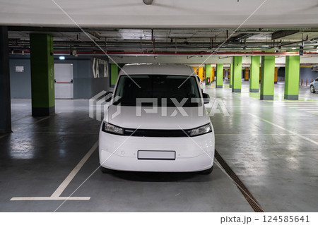 White delivery van on an underground parking White delivery van on an underground parking 124585641