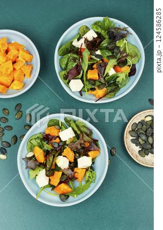 Fresh autumn pumpkin salad. 124586285