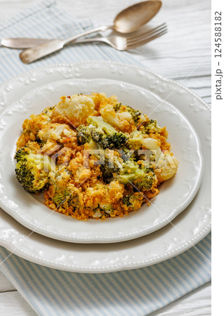 broccoli cauliflower casserole on plate, top view broccoli cauliflower casserole on plate, top view 124588182