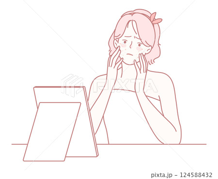 A woman is expressing her concerns and feelings while gazing thoughtfully into a mirror A woman is expressing her concerns and feelings while gazing thoughtfully into a mirror 124588432