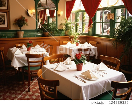 Cozy lighting highlights the stylish decor of an italian eatery, featuring arranged tables, wooden seating, and a fully stocked bar framed by brick arches, to create an inviting ambiance 124589323