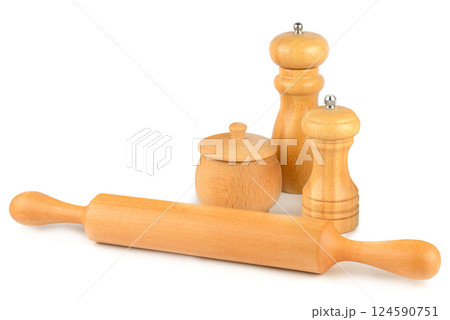 Set of wooden kitchen utensils isolated on white. Free space for text. Set of wooden kitchen utensils isolated on white. Free space for text. 124590751