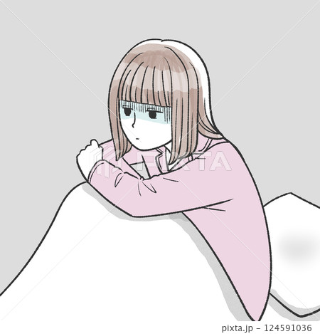 布団の中でしんどそうな女性 124591036