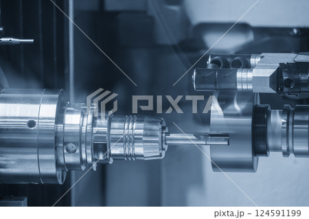 The CNC tool regrinding machine in the light blue scene. The CNC tool regrinding machine in the light blue scene. 124591199