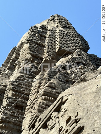 Masroor Rock-cut Temple. Ancient stone carvings on hindu temple in India. Example of Indian rock-cut architecture. This temple was carved from a large rock in an early 8th-century. 124592087