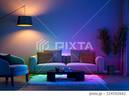 a modern living room with ambient LED lighting and comfortable furniture. 3D render 124592682