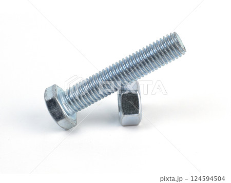 Close-up of a metal bolt and nut on a clean white background 124594504