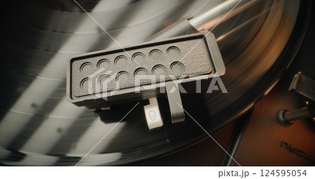 Retro Sound System: Vinyl Record Spinning On Vintage Turntable Retro Sound System: Vinyl Record Spinning On Vintage Turntable 124595054