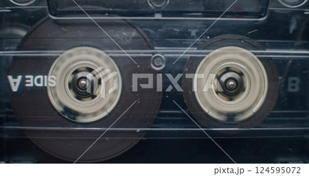 Playback of Mixtapes Collection Using Retro Hi-Fi Audio Equipment. Reel Tape Recorder 124595072