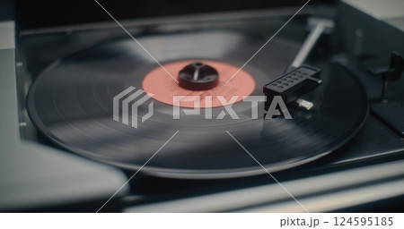 Vinyl Record Spinning On Vintage Turntable, Playing Classic Music Vinyl Record Spinning On Vintage Turntable, Playing Classic Music 124595185