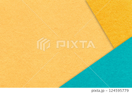 Texture craft light ocher paper background with yellow and blue border. Vintage abstract cardboard Texture craft light ocher paper background with yellow and blue border. Vintage abstract cardboard 124595779