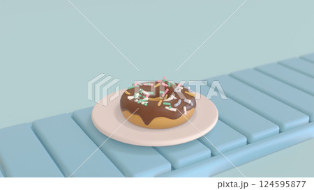 ベルトコンベアの上のお皿に乗ったチョコドーナツ 124595877