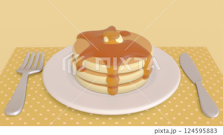 食卓の上のお皿とホットケーキ 124595883