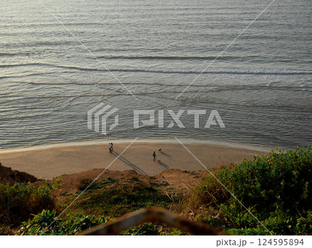 Picturesque summer landscape of sea, coast and beach. Peaceful, calm evening Picturesque summer landscape of sea, coast and beach. Peaceful, calm evening 124595894