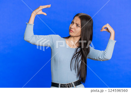 Woman showing blah blah gesture with hands gossips empty promises liars not interested in talking Woman showing blah blah gesture with hands gossips empty promises liars not interested in talking 124596560