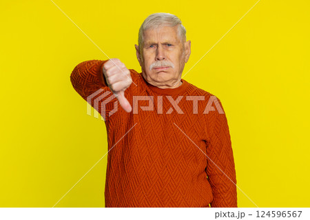 Upset grandfather man showing thumbs down gesture disapproval dissatisfied dislike negative feedback 124596567