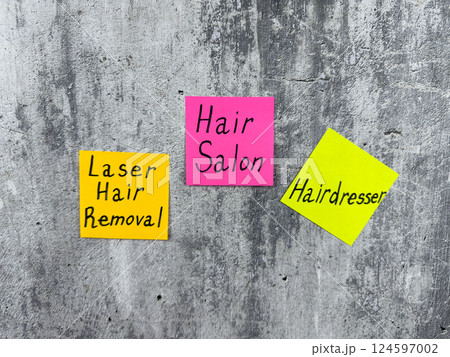 Sticky notes with words about body hair care. Concept of going to beauty salon to hairdresser to create attractive image. Importance of hair care, human hair Sticky notes with words about body hair care. Concept of going to beauty salon to hairdresser to create attractive image. Importance of hair care, human hair 124597002