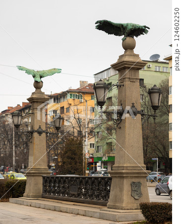 Busy traffic on ancient bridge over Perlovska River passes through Eagles Bridge. 124602250