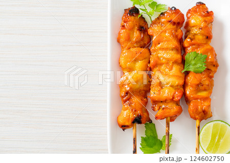 grilled chicken skewer with herbs and spices 124602750