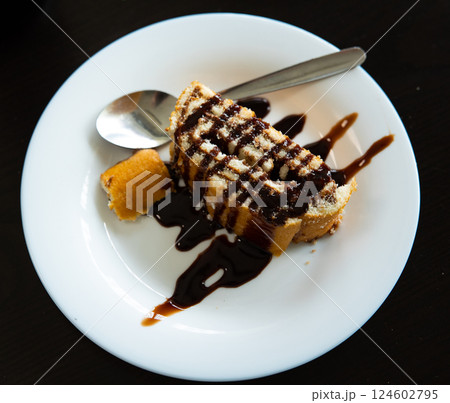 Spanish sweet dessert Brazo de Gitano with filling of nutella 124602795