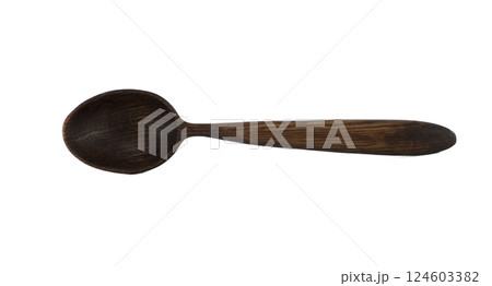 Isolated on white, a rustic dark wooden spoon showcases its handcrafted details and natural grain. 124603382
