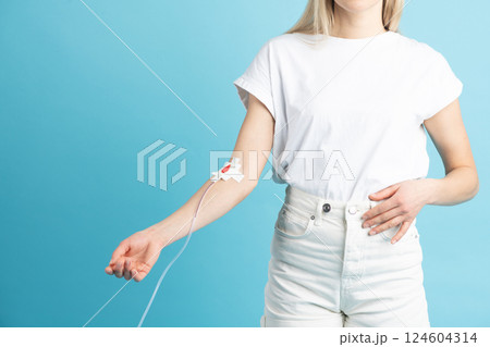 Conceptual image of woman giving blood Conceptual image of woman giving blood 124604314