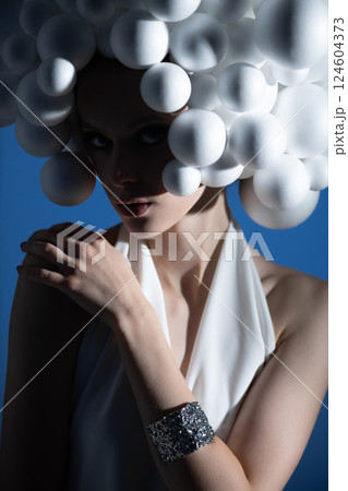 Futuristic Portrait with Geometric Headpiece 124604373
