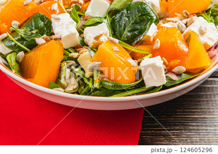 Chicken salad with feta, spinach, and fresh veggies in a bowl 124605296