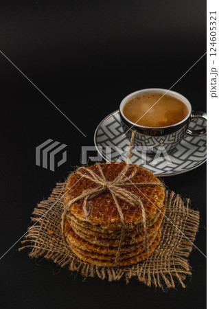 Delight in caramel waffles paired with coffee for national caramel day 124605321