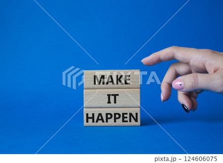 Make it Happen symbol. Concept words Make it Happen on wooden blocks. Beautiful blue background. Businessman hand. Business and Make it Happen concept. Copy space. 124606075