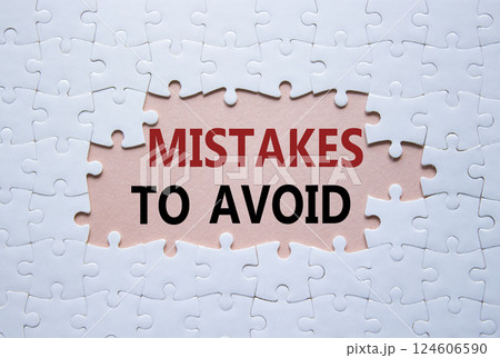 Mistakes symbol. Concept words Mistakes to Avoid on white puzzle. Beautiful pink background Business and Mistakes to Avoid concept. Copy space. Mistakes symbol. Concept words Mistakes to Avoid on white puzzle. Beautiful pink background Business and Mistakes to Avoid concept. Copy space. 124606590