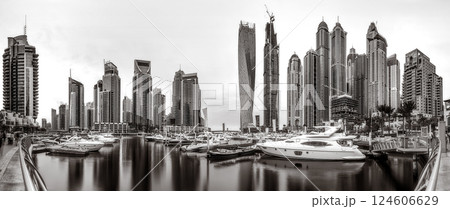 Panoramic view of Dubai Marina bay with yacht and cloudy sky, Dubai, UAE. Panoramic view of Dubai Marina bay with yacht and cloudy sky, Dubai, UAE. 124606629