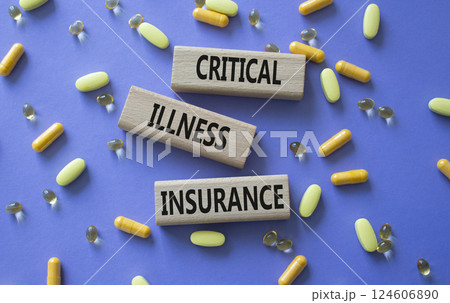 Critical Illness Insurance symbol. Concept word Critical Illness Insurance on wooden blocks. Beautiful purple background with pills. Medicine and Critical Illness Insurance concept. Copy space 124606890