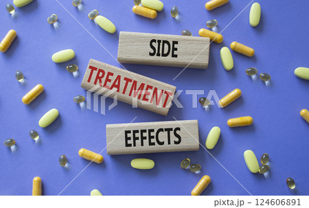 Side Treatment Effects symbol. Concept words Side Treatment Effects on wooden blocks. Beautiful purple background with pills. Healthcare and Side Treatment Effects concept. Copy space. Side Treatment Effects symbol. Concept words Side Treatment Effects on wooden blocks. Beautiful purple background with pills. Healthcare and Side Treatment Effects concept. Copy space. 124606891
