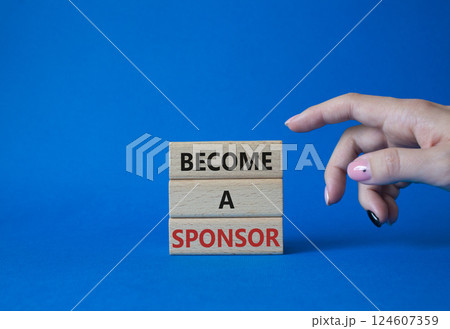 Become a sponsor symbol. Concept word Become a sponsor on wooden blocks. Businessman hand. Beautiful blue background. Business and Become a sponsor concept. Copy space Become a sponsor symbol. Concept word Become a sponsor on wooden blocks. Businessman hand. Beautiful blue background. Business and Become a sponsor concept. Copy space 124607359
