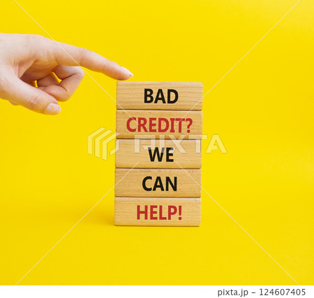 Bad credit We can Help symbol. Wooden blocks with words Bad credit We can Help. Businessman hand. Beautiful yellow background. Business and Bad credit We can Help concept. Copy space. Bad credit We can Help symbol. Wooden blocks with words Bad credit We can Help. Businessman hand. Beautiful yellow background. Business and Bad credit We can Help concept. Copy space. 124607405