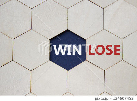 Win or Lose symbol. Concept word Win or Lose on wooden comb puzzle. Beautiful deep blue background. Business and Win or Lose concept. Copy space 124607452