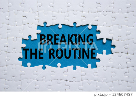 Breaking the Routine symbol. White puzzle with words Breaking the Routine. Beautiful blue background. Business and Breaking the Routine concept. Copy space. Breaking the Routine symbol. White puzzle with words Breaking the Routine. Beautiful blue background. Business and Breaking the Routine concept. Copy space. 124607457