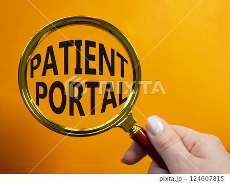 Patient Portal symbol. Magnifying glass with words Patient Portal. Businessman hand. Beautiful orange background. Medicine and Patient Portal concept. Copy space. Patient Portal symbol. Magnifying glass with words Patient Portal. Businessman hand. Beautiful orange background. Medicine and Patient Portal concept. Copy space. 124607815