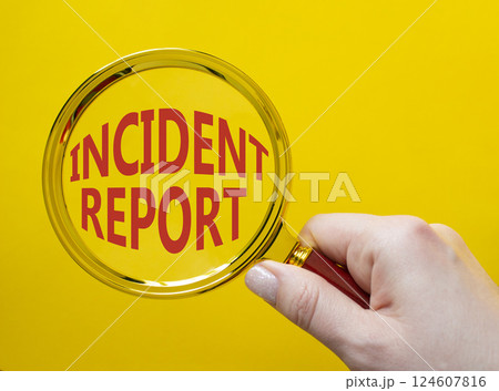 Incident Report symbol. Concept word Incident Report on magnifying glass. Businessman hand. Beautiful yellow background. Business and Incident Report concept. Copy space Incident Report symbol. Concept word Incident Report on magnifying glass. Businessman hand. Beautiful yellow background. Business and Incident Report concept. Copy space 124607816