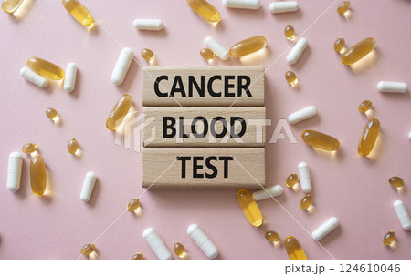 Cancer Blood Test symbol. Concept word Cancer Blood Test on wooden blocks. Beautiful pink background with pills. Medicine and Cancer Blood Test concept. Copy space Cancer Blood Test symbol. Concept word Cancer Blood Test on wooden blocks. Beautiful pink background with pills. Medicine and Cancer Blood Test concept. Copy space 124610046