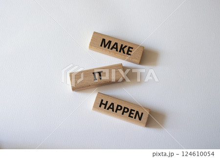 Make it Happen symbol. Concept words Make it Happen on wooden blocks. Beautiful white background. Business and Make it Happen concept. Copy space. 124610054