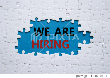 We are Hiring symbol. Concept words We are Hiring on white puzzle. Beautiful blue background. Business and We are Hiring concept. Copy space. We are Hiring symbol. Concept words We are Hiring on white puzzle. Beautiful blue background. Business and We are Hiring concept. Copy space. 124610124