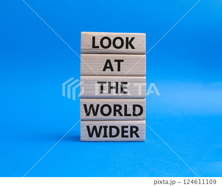 Look at the world wider symbol. Wooden blocks with words Look at the world wider. Beautiful blue background. Business and Look at the world wider concept. Copy space. Look at the world wider symbol. Wooden blocks with words Look at the world wider. Beautiful blue background. Business and Look at the world wider concept. Copy space. 124611109