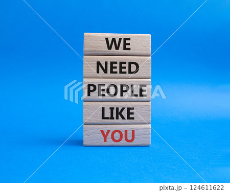Hiring symbol. Wooden blocks with words We need People like You. Beautiful blue background. Business and Hiring concept. Copy space. Hiring symbol. Wooden blocks with words We need People like You. Beautiful blue background. Business and Hiring concept. Copy space. 124611622